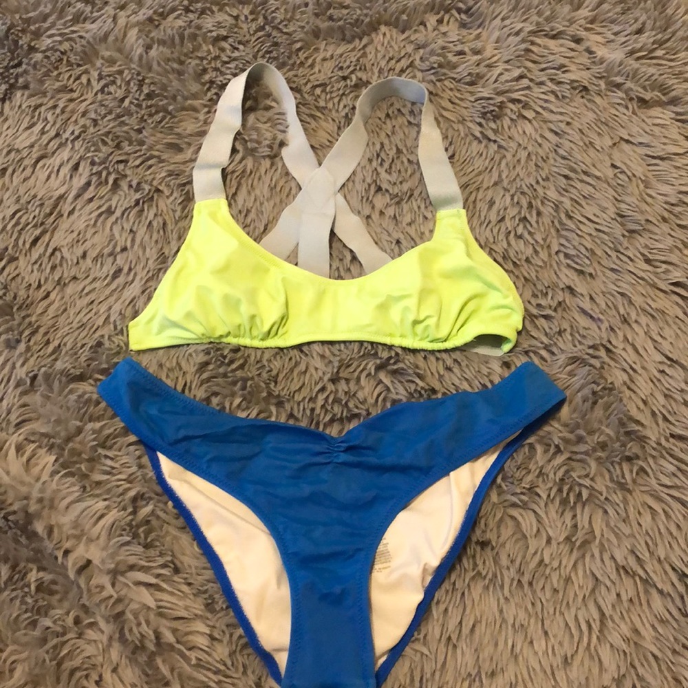 A yellow, silver, blue PINK swimsuit.